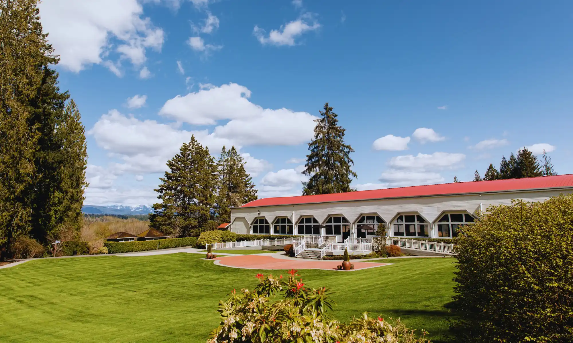 Outdoor venue and lawn at Carnation Farms used for destination wedding celebrations.