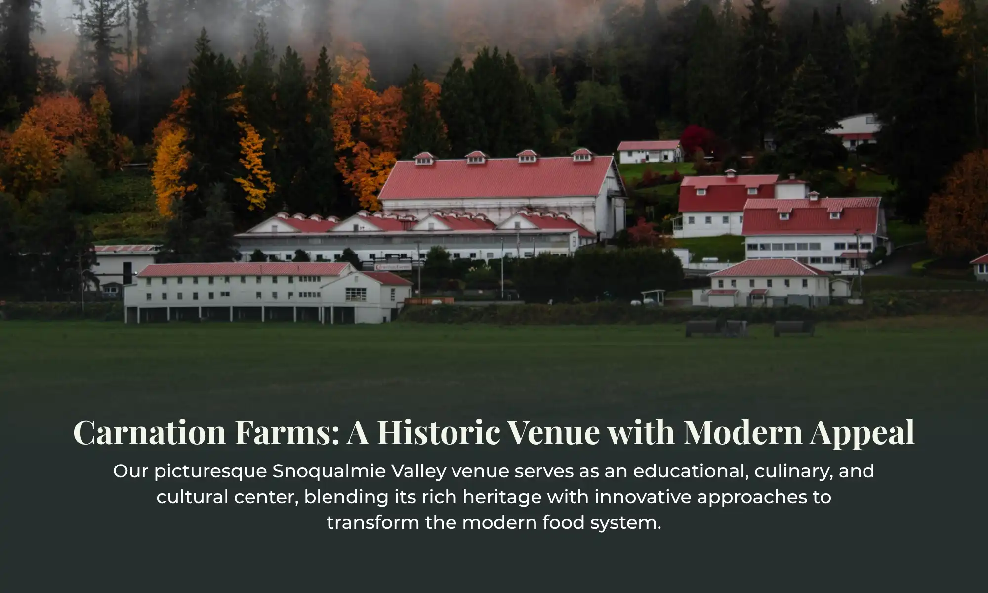 Aerial view of Carnation Farms historic red-roofed buildings in Snoqualmie Valley