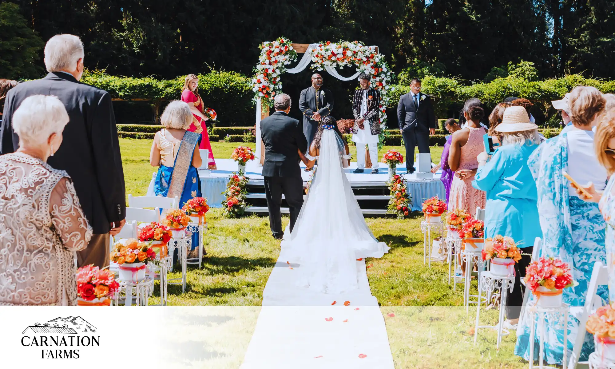 Outdoor farm wedding ceremony at Carnation Farms with floral arch and guests seated
