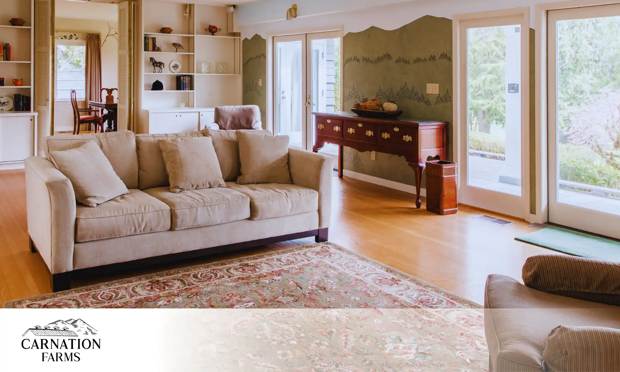 Cozy living room inside Carnation Farms overnight wedding venue with natural light and comfortable seating.