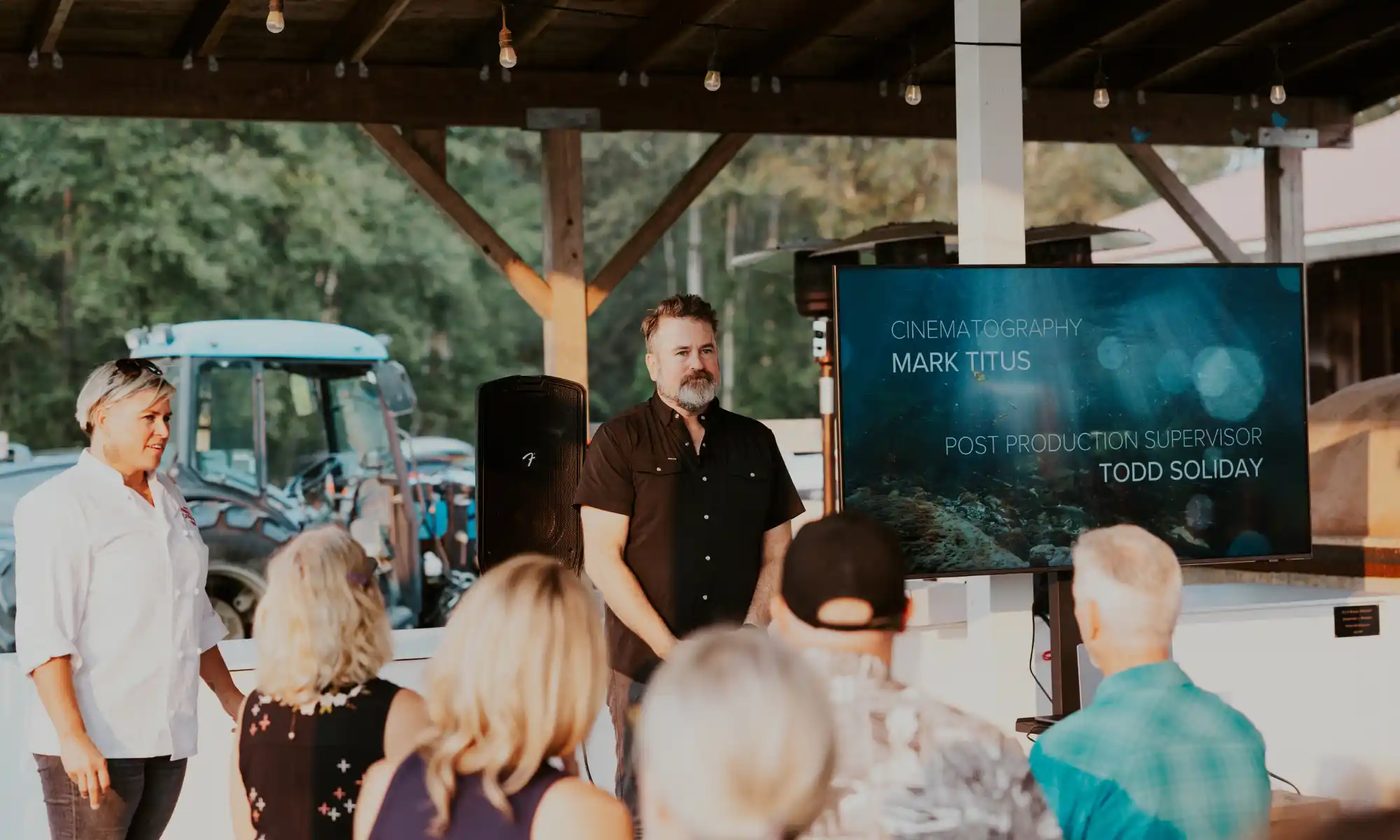 Corporate retreat workshop session with a team presentation.